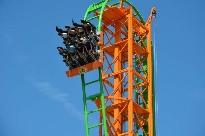 People riding a roller-coaster