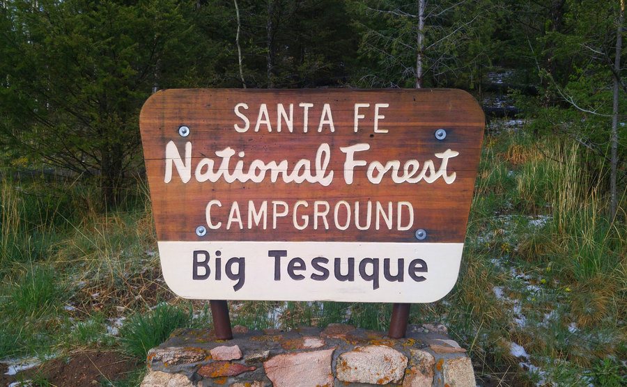 A sign that reads ‘‘Santa Fe, Natural Forest Campground, Big Tesuque.’’